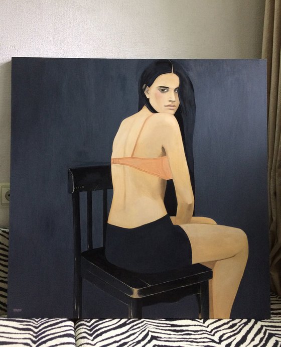 Girl on a chair.