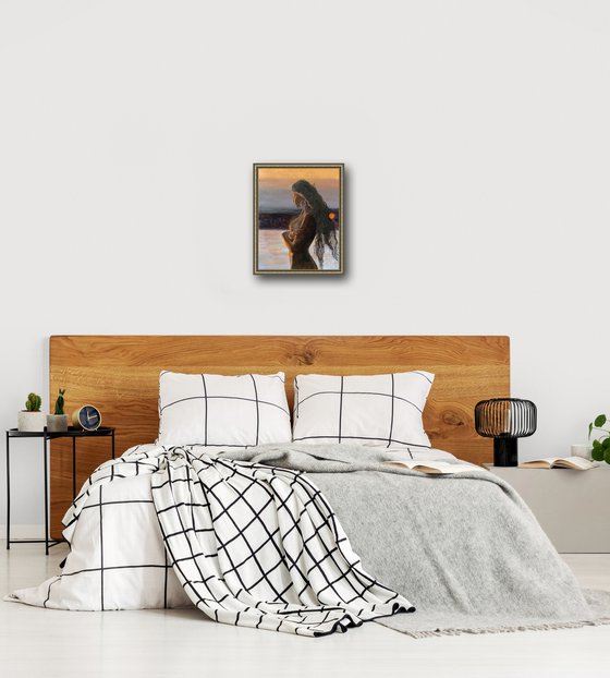 Naked woman by the river