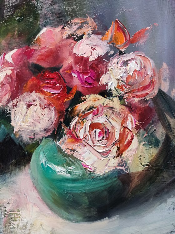 Roses in a green vase