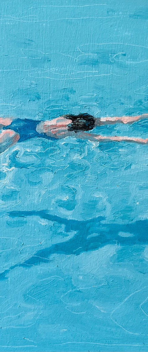 Swimmer in pool. by Stephen Brook