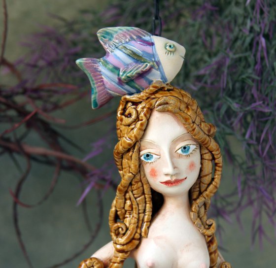 Mermaid with a fish,  Wall sculpture by Elya Yalonetski.