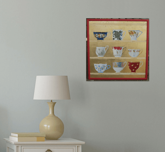 Teacups on gold background