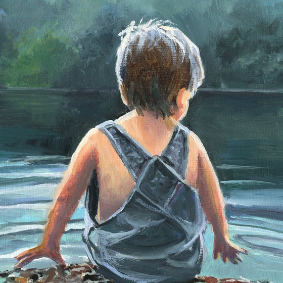 Child in twilight lake scene