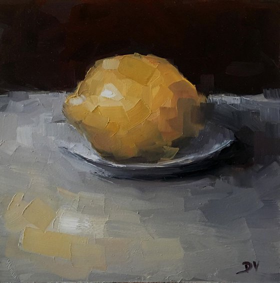 Lemon with plate.