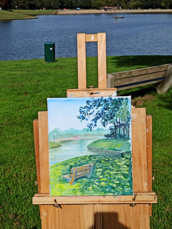 Sunny day at the lake in the park. Pleinair