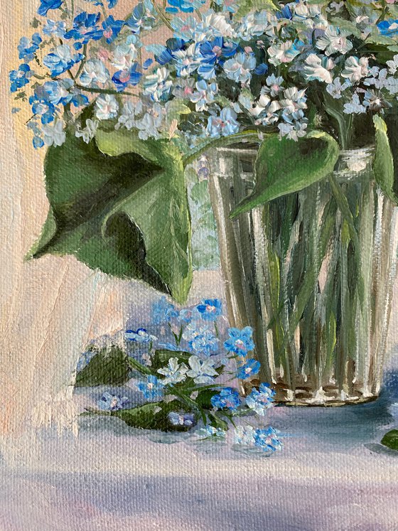 Spring hello.  A blue bouquet by the open window.