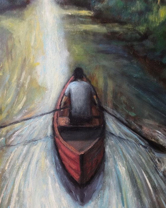 Man on rowing boat