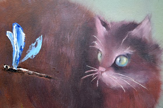 Cat and dragonfly