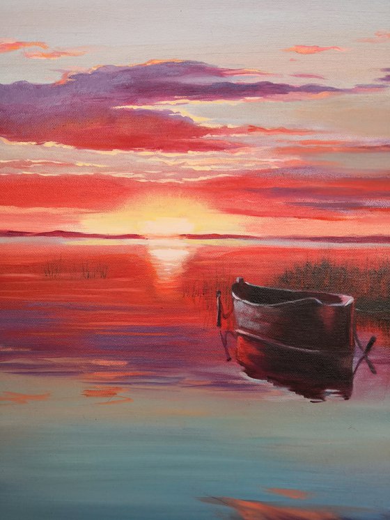 Sunset on the lake with boats landscape