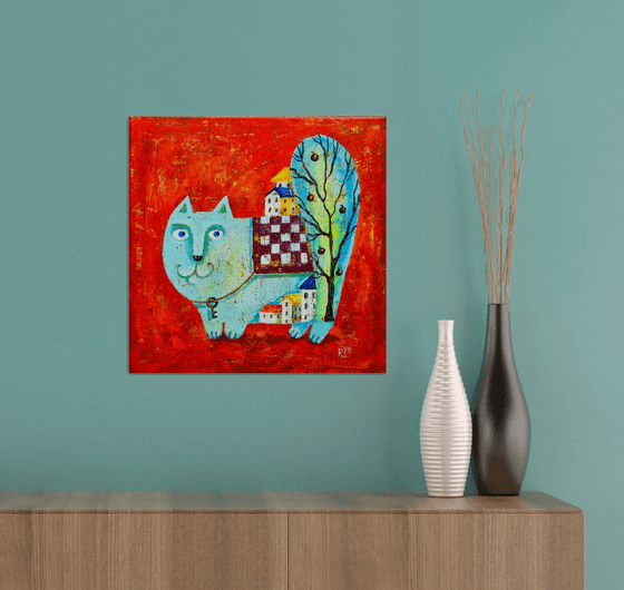 Blue cat on red