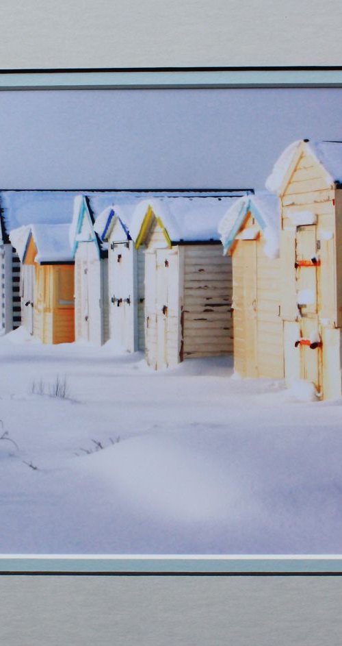 Beach Huts in Snow by Robin Clarke