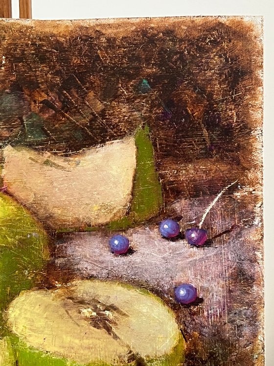 Green apples on dark