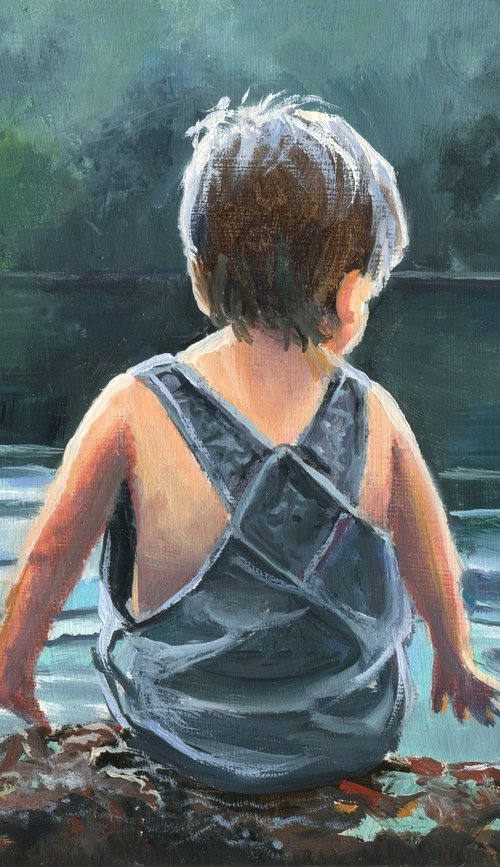 Child in twilight lake scene by Lucia Verdejo