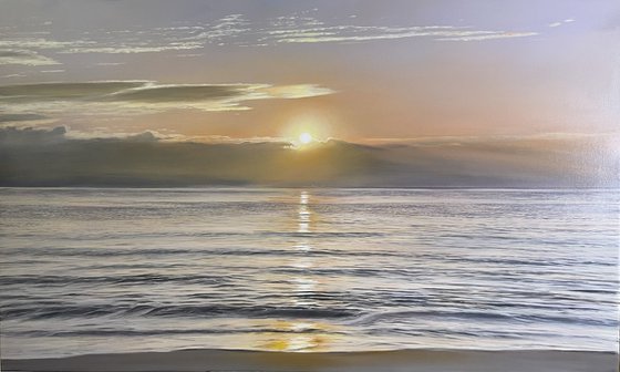 Golden Sunrise Over Calm Ocean