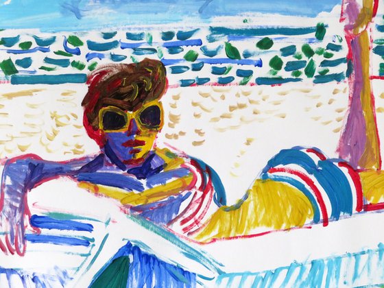 The beach with woman sunbathing