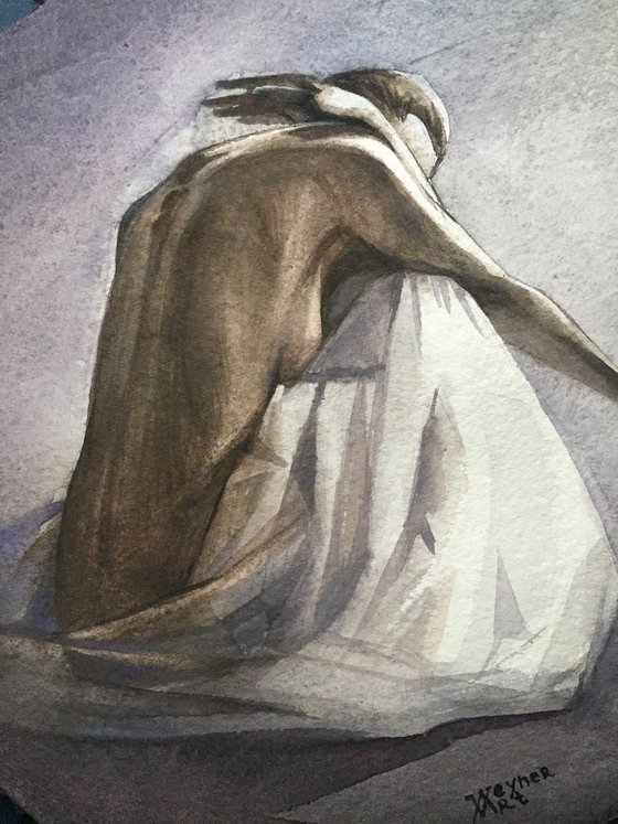 Nude seated woman
