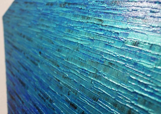 Iridescent blue knife texture