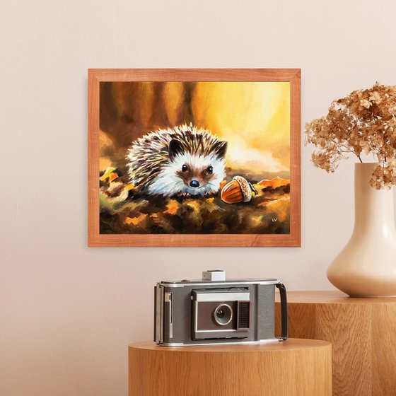 Hedgehog with acorn in fall