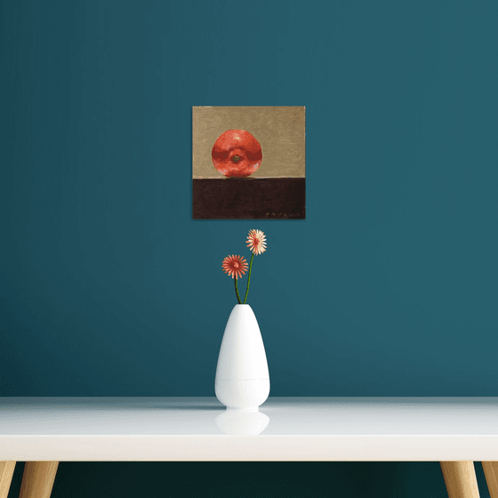 still life of fresh red apple on ocher background