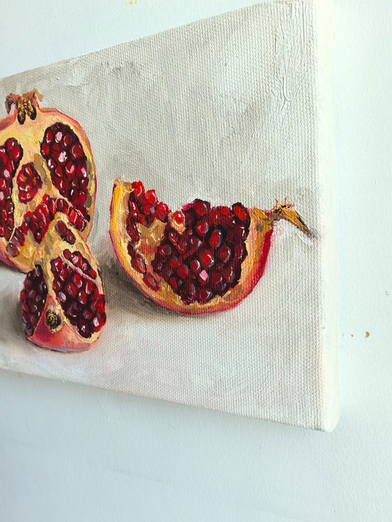 Pomegranate on white