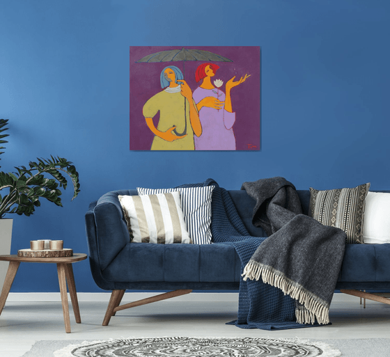 Two under an umbrella.