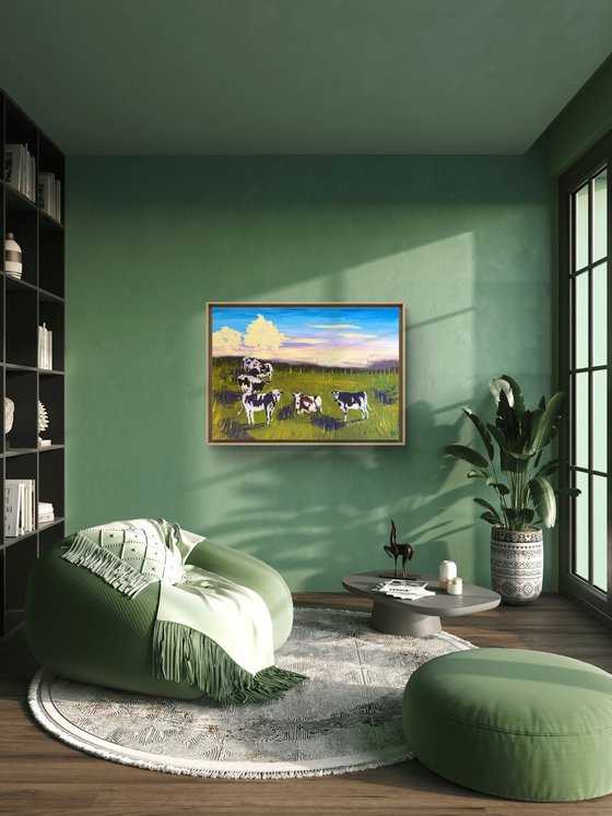 Cows grazing in the field
