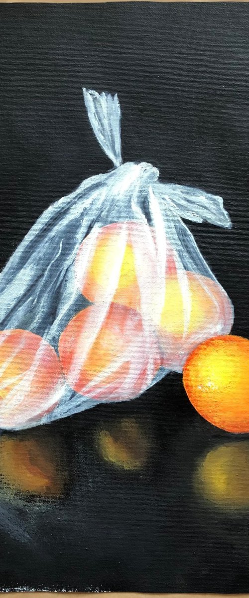 Oranges in plastic bag by Lena Smirnova