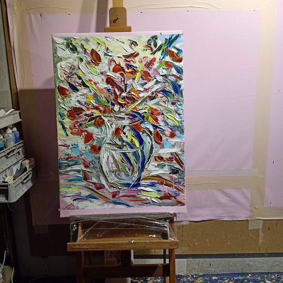 Vaso con fiori arancio