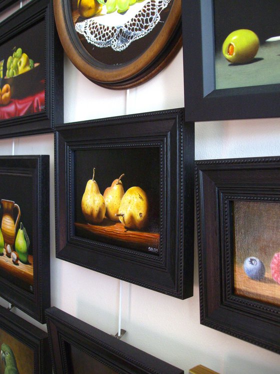 Three pears in chiaroscuro