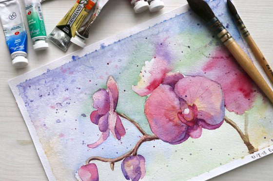 Branch of a blooming orchid. Original watercolor artwork.