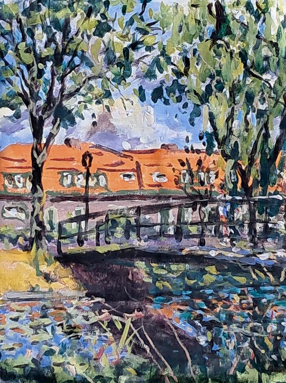 Bridge to red roofs