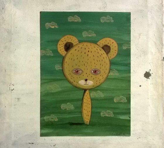 teddy bear on green background