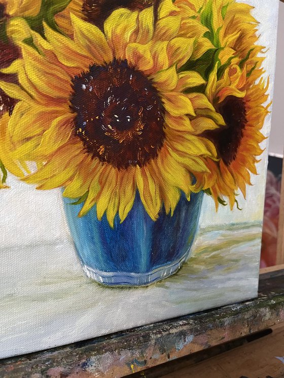 Sunflowers in a Blue Vase