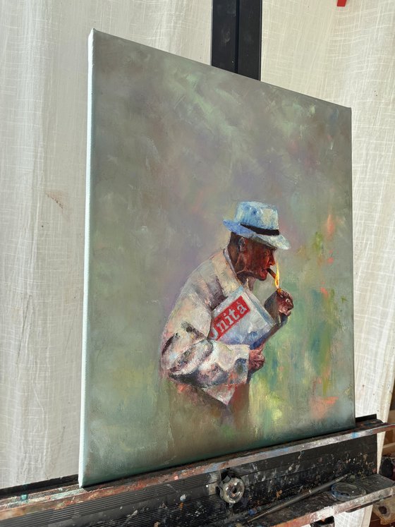Smoking man with a newspaper