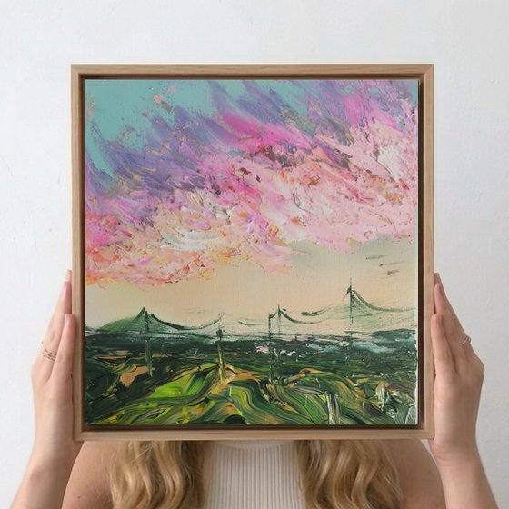 Impressionistic pink sky clouds green rainbow