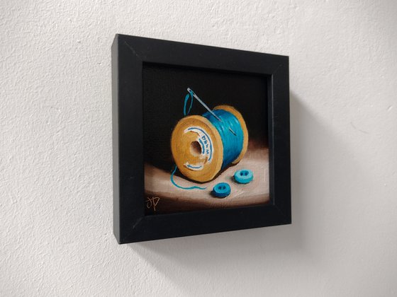 Little blue cotton reel  still life