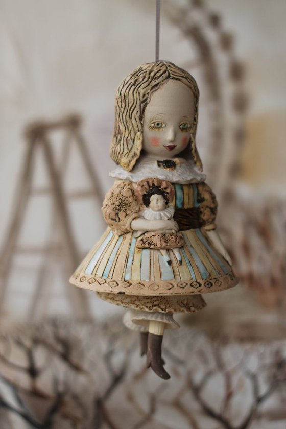 Girl with a Doll. From "Le Carousel, Hommage à l'Innocence" project by Elya Yalonetski
