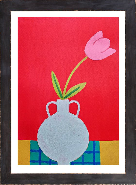 A Single Pink Tulip on Red