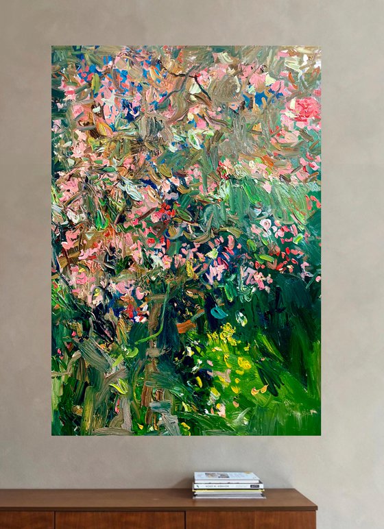 In a shadow of apple trees in flower.