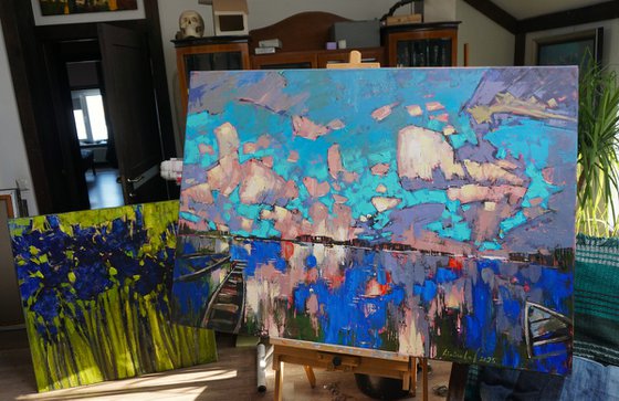 Mirror of water, boats in the clouds