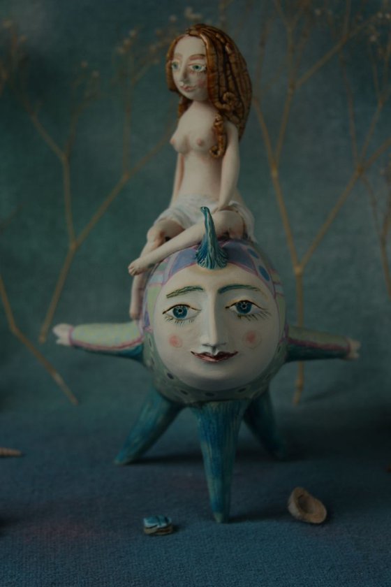 Girl riding the moon fish. Sculpture by Elya Yalonetski, 2018