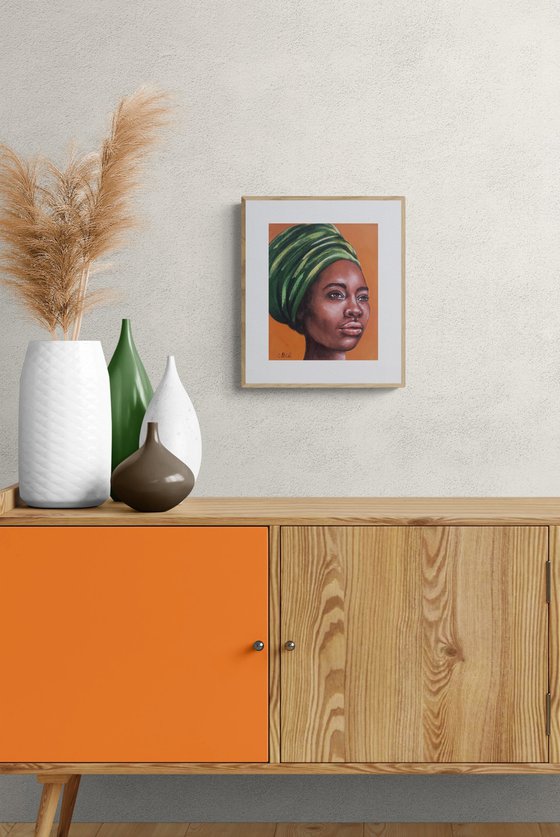 African woman with green scarf