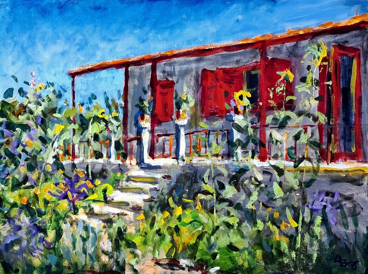 House with yellow sunflowers by Dimitris Voyiazoglou