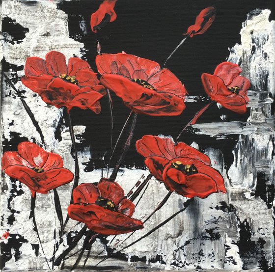 White on black background with red poppies