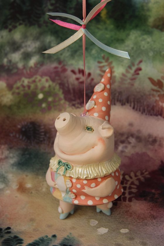 Little piggy in harlequin dress. Hanging sculpture, bell doll by Elya Yalonetski