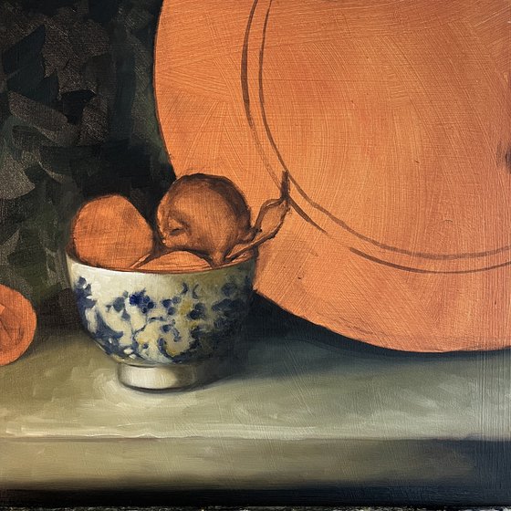 Plums and gold plate.