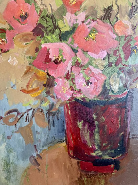 Flowers in a red vase