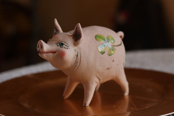 Pig with a lucky clover. by Elya Yalonetski