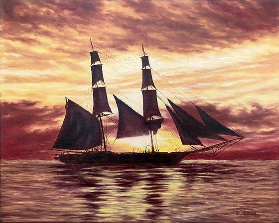 Sails in the orange sunset
