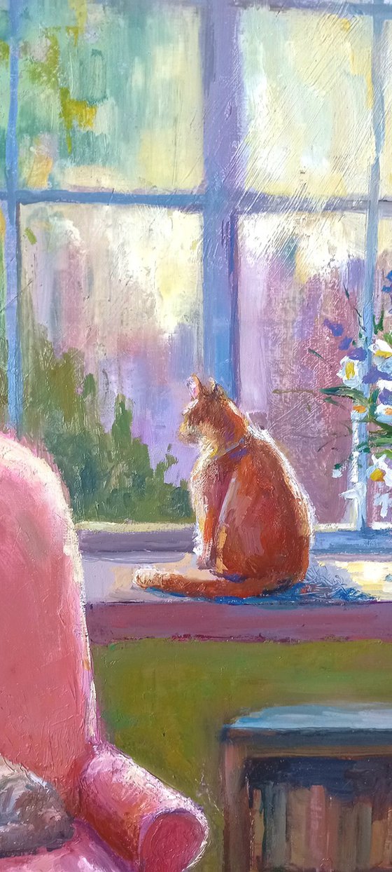 Ginger cat and armchair